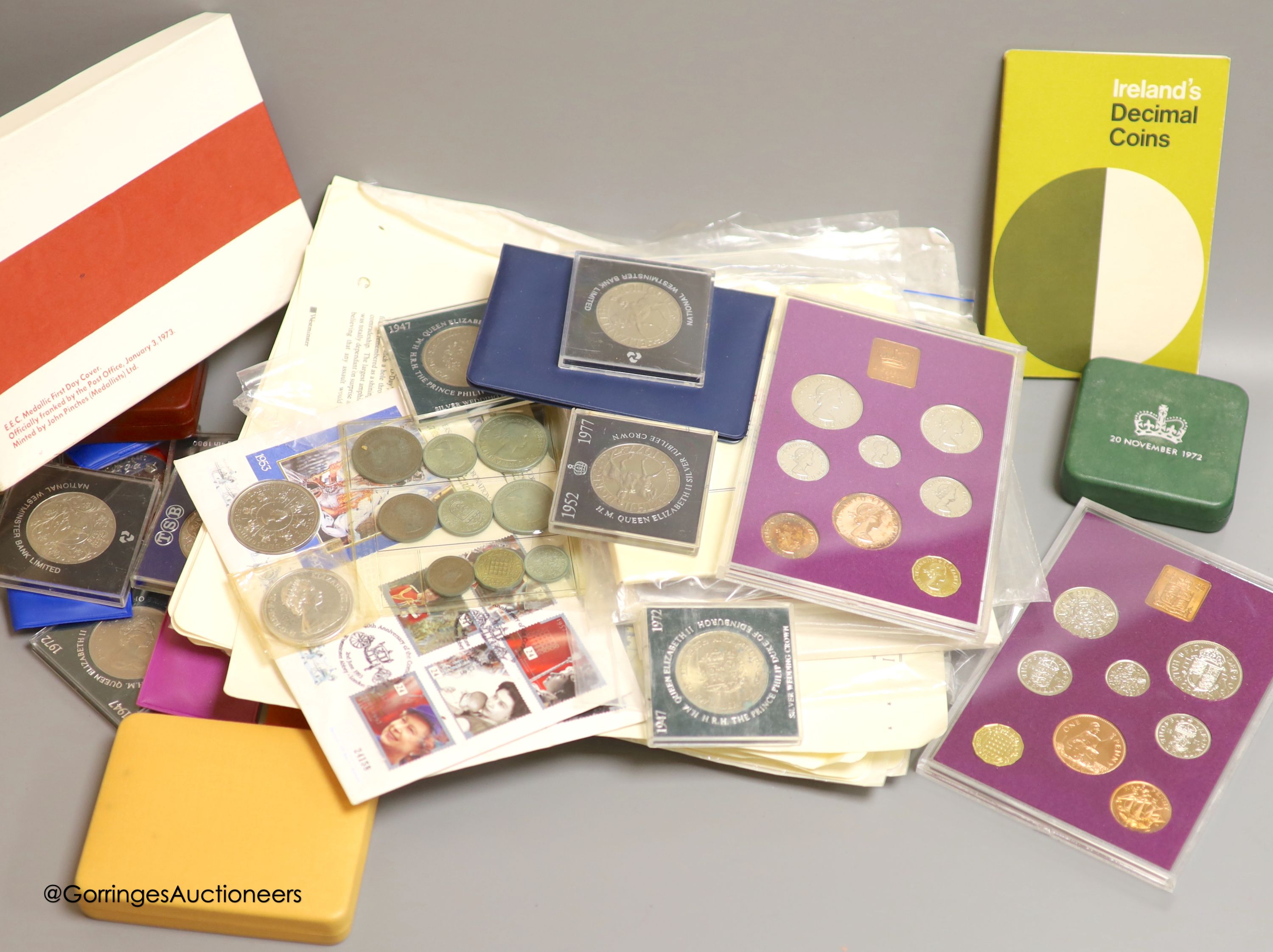A collection of mostly Royal Mint UK commemorative coins and cover and five UK Brilliant Uncirculated coin collections for 1984 x2, 1986 x2 and 1987.